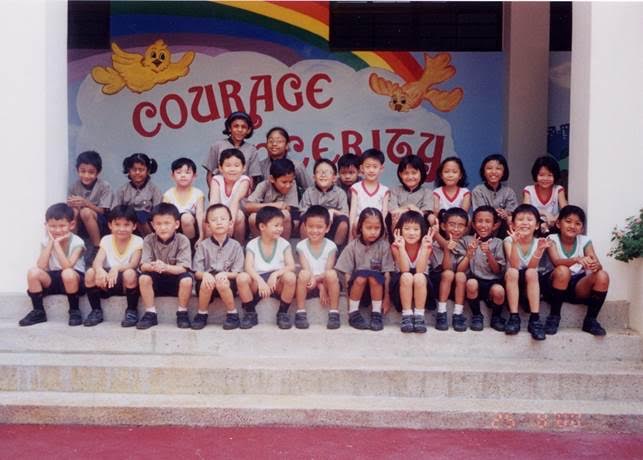 Anderson Primary's first cohort in a class photograph from 2000